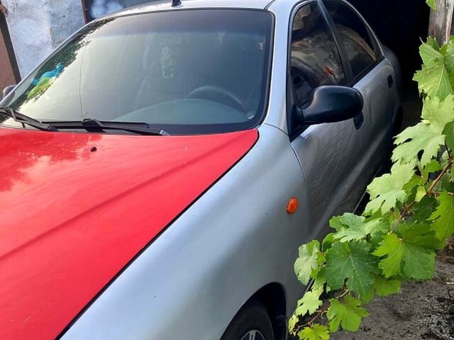 Коричневый Дэу Ланос, объемом двигателя 2.2 л и пробегом 103 тыс. км за 2500 $, фото 1 на Automoto.ua