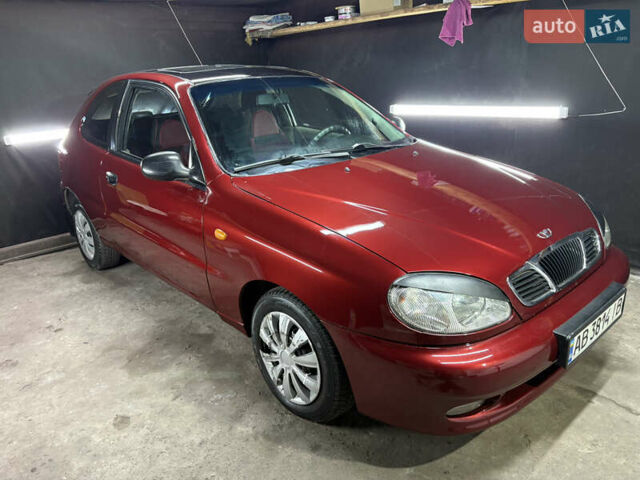 Красный Дэу Ланос, объемом двигателя 1.6 л и пробегом 200 тыс. км за 2000 $, фото 1 на Automoto.ua