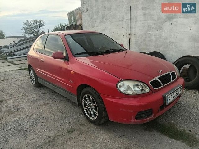 Красный Дэу Ланос, объемом двигателя 1.6 л и пробегом 275 тыс. км за 1650 $, фото 1 на Automoto.ua