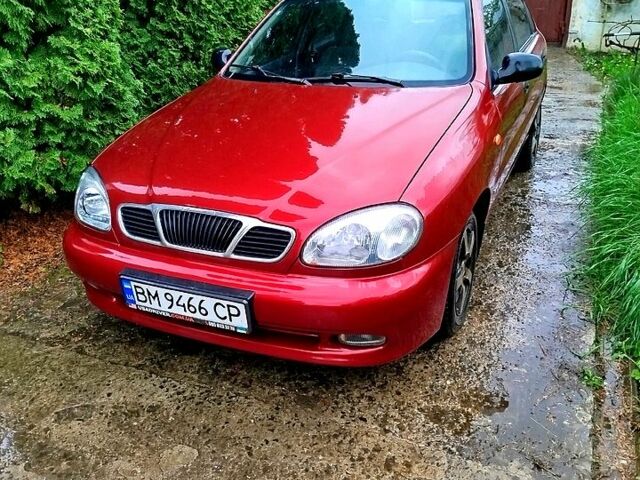 Красный Дэу Ланос, объемом двигателя 1.5 л и пробегом 227 тыс. км за 1500 $, фото 1 на Automoto.ua