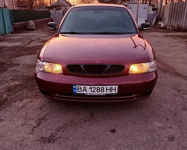 Червоний Деу Ланос, об'ємом двигуна 1.6 л та пробігом 180 тис. км за 1800 $, фото 1 на Automoto.ua