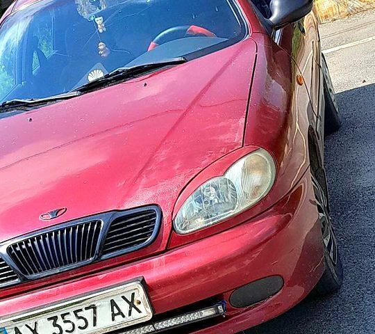 Красный Дэу Ланос, объемом двигателя 1.5 л и пробегом 250 тыс. км за 2300 $, фото 1 на Automoto.ua