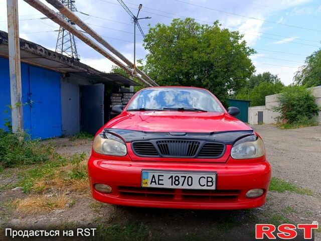 Красный Дэу Ланос, объемом двигателя 1.5 л и пробегом 172 тыс. км за 2000 $, фото 1 на Automoto.ua