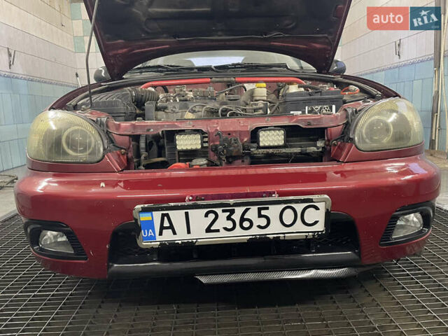 Червоний Деу Ланос, об'ємом двигуна 1.5 л та пробігом 310 тис. км за 2400 $, фото 1 на Automoto.ua