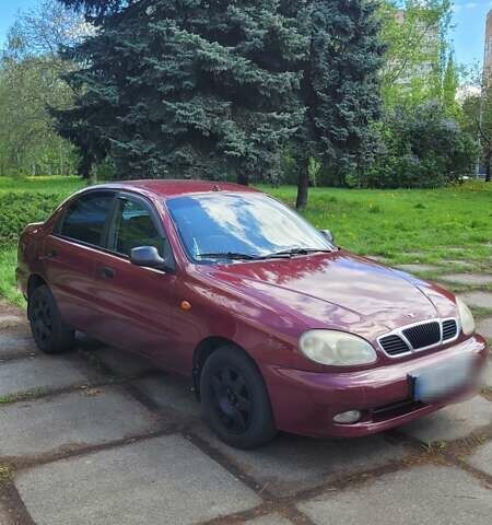 Красный Дэу Ланос, объемом двигателя 1.5 л и пробегом 283 тыс. км за 2800 $, фото 1 на Automoto.ua