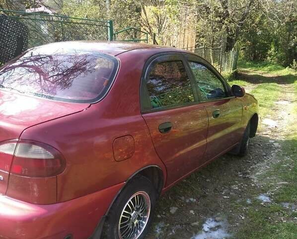 Червоний Деу Ланос, об'ємом двигуна 1.5 л та пробігом 162 тис. км за 2400 $, фото 1 на Automoto.ua