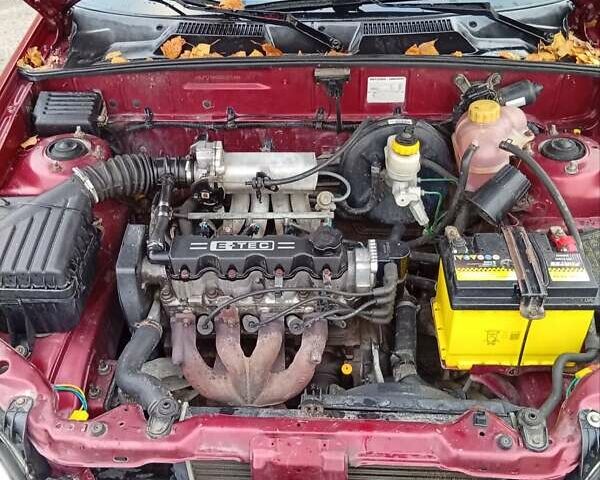 Красный Дэу Ланос, объемом двигателя 1.5 л и пробегом 174 тыс. км за 1550 $, фото 1 на Automoto.ua