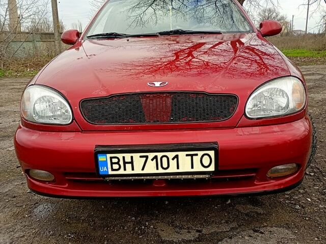 Красный Дэу Ланос, объемом двигателя 1.5 л и пробегом 0 тыс. км за 2100 $, фото 1 на Automoto.ua