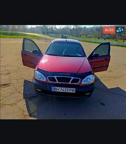 Красный Дэу Ланос, объемом двигателя 1.6 л и пробегом 175 тыс. км за 2500 $, фото 1 на Automoto.ua