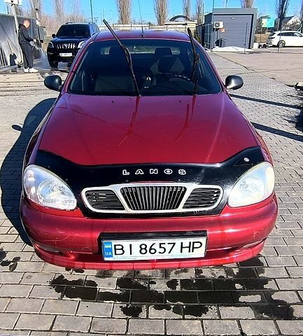 Красный Дэу Ланос, объемом двигателя 1.5 л и пробегом 205 тыс. км за 2700 $, фото 1 на Automoto.ua