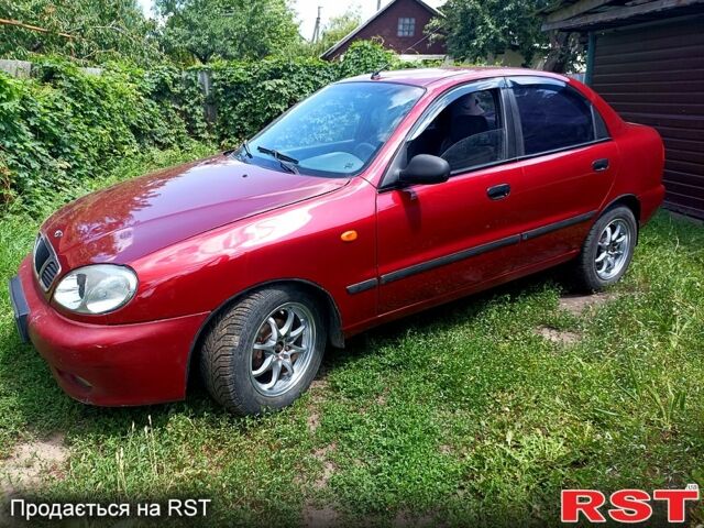 Деу Ланос 2004 у Мерефа на Automoto.ua Червоний Деу Ланос, об'ємом двигуна 1.5 л та пробігом 400 тис. км за 2200 $, фото 1 на Automoto.ua