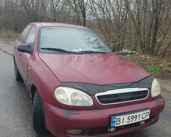 Красный Дэу Ланос, объемом двигателя 1.5 л и пробегом 226 тыс. км за 2400 $, фото 1 на Automoto.ua