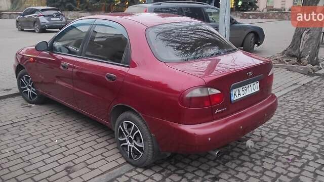 Красный Дэу Ланос, объемом двигателя 1.5 л и пробегом 260 тыс. км за 2150 $, фото 1 на Automoto.ua