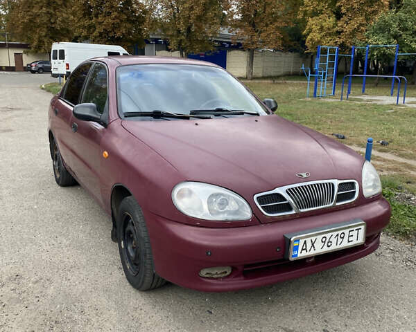Красный Дэу Ланос, объемом двигателя 1.6 л и пробегом 210 тыс. км за 2000 $, фото 1 на Automoto.ua