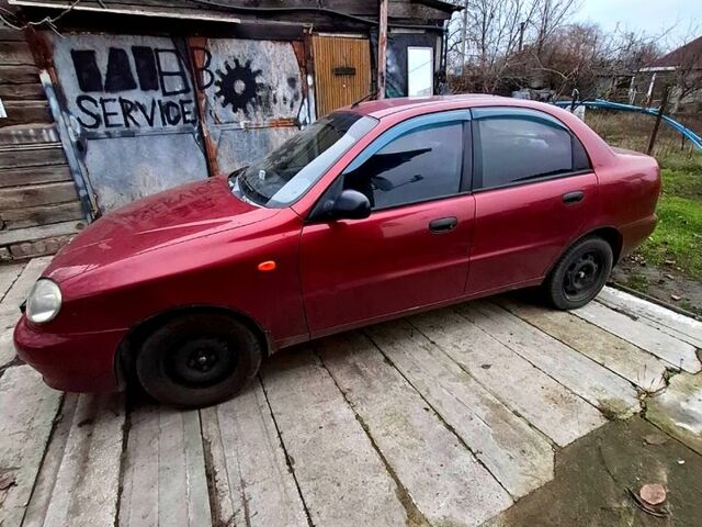 Червоний Деу Ланос, об'ємом двигуна 1.5 л та пробігом 266 тис. км за 1800 $, фото 1 на Automoto.ua