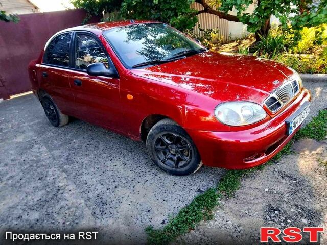 Красный Дэу Ланос, объемом двигателя 1.5 л и пробегом 230 тыс. км за 1700 $, фото 1 на Automoto.ua