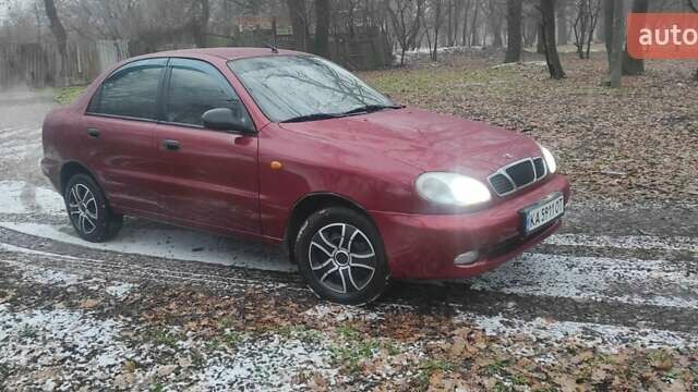 Красный Дэу Ланос, объемом двигателя 1.5 л и пробегом 260 тыс. км за 2500 $, фото 1 на Automoto.ua