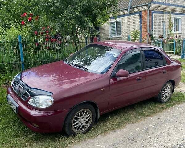 Красный Дэу Ланос, объемом двигателя 1.6 л и пробегом 222 тыс. км за 2660 $, фото 1 на Automoto.ua