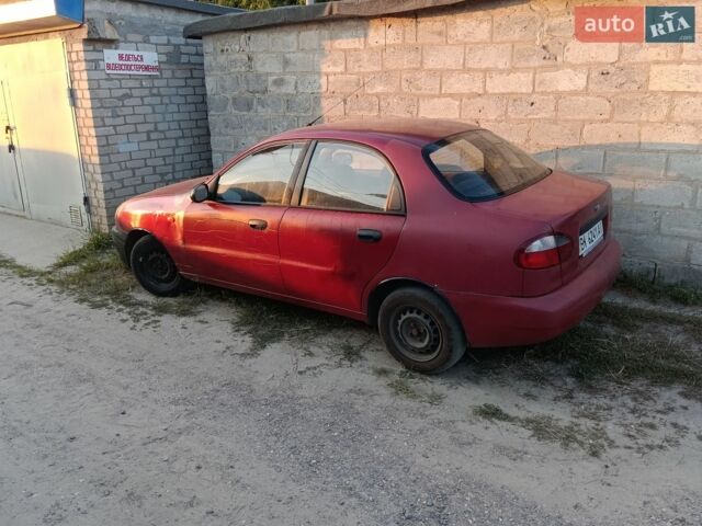 Красный Дэу Ланос, объемом двигателя 1.5 л и пробегом 250 тыс. км за 850 $, фото 1 на Automoto.ua