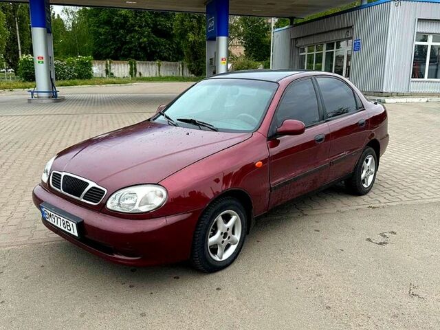 Красный Дэу Ланос, объемом двигателя 1.5 л и пробегом 310 тыс. км за 1950 $, фото 1 на Automoto.ua
