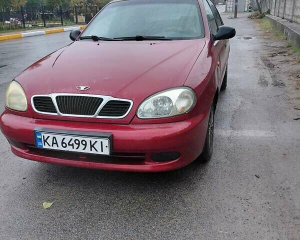 Красный Дэу Ланос, объемом двигателя 1.5 л и пробегом 309 тыс. км за 2000 $, фото 1 на Automoto.ua