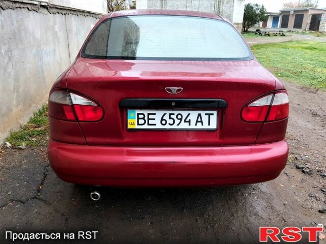 Красный Дэу Ланос, объемом двигателя 1.5 л и пробегом 191 тыс. км за 2300 $, фото 1 на Automoto.ua