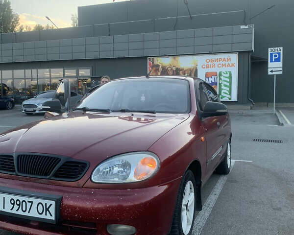 Красный Дэу Ланос, объемом двигателя 1.5 л и пробегом 348 тыс. км за 2000 $, фото 1 на Automoto.ua