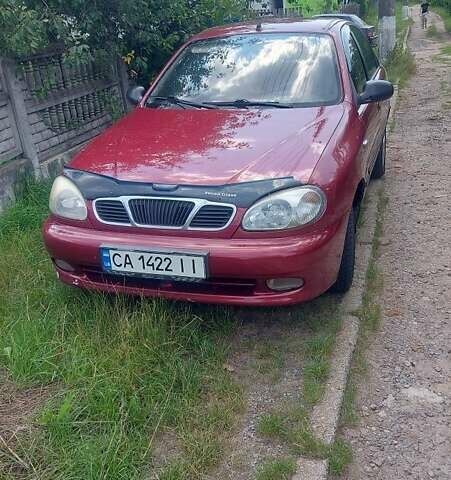 Красный Дэу Ланос, объемом двигателя 1.5 л и пробегом 146 тыс. км за 2300 $, фото 1 на Automoto.ua