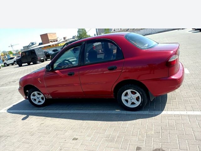 Красный Дэу Ланос, объемом двигателя 1.5 л и пробегом 150 тыс. км за 1300 $, фото 1 на Automoto.ua