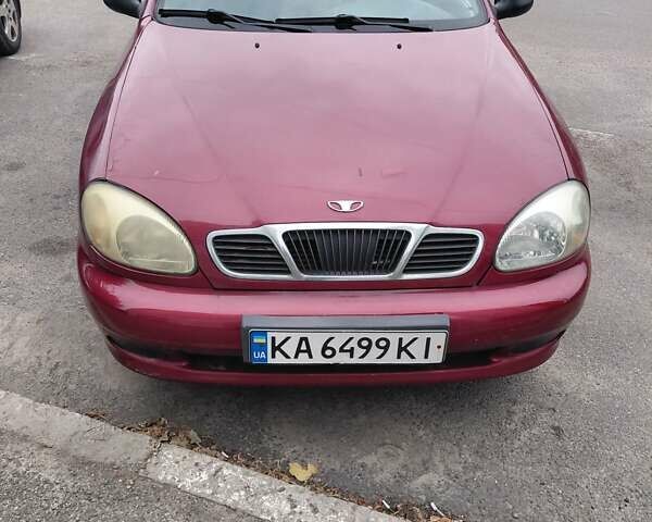 Красный Дэу Ланос, объемом двигателя 1.5 л и пробегом 309 тыс. км за 2200 $, фото 1 на Automoto.ua