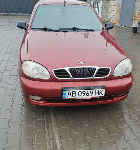 Красный Дэу Ланос, объемом двигателя 1.5 л и пробегом 153 тыс. км за 2000 $, фото 1 на Automoto.ua