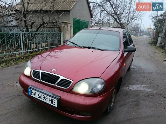Красный Дэу Ланос, объемом двигателя 1.3 л и пробегом 270 тыс. км за 1500 $, фото 1 на Automoto.ua
