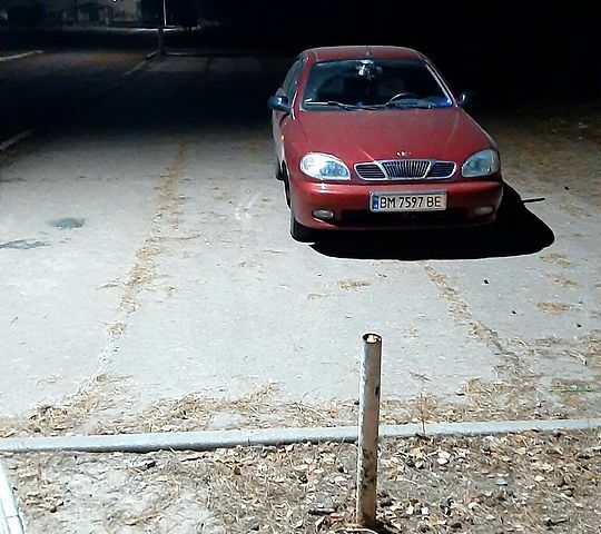 Красный Дэу Ланос, объемом двигателя 1.5 л и пробегом 156 тыс. км за 2700 $, фото 1 на Automoto.ua