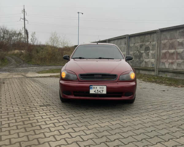 Красный Дэу Ланос, объемом двигателя 1.5 л и пробегом 399 тыс. км за 2499 $, фото 1 на Automoto.ua