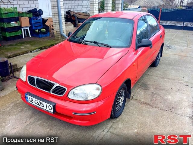 Красный Дэу Ланос, объемом двигателя 1.5 л и пробегом 350 тыс. км за 2000 $, фото 1 на Automoto.ua