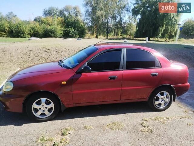Красный Дэу Ланос, объемом двигателя 1.5 л и пробегом 322 тыс. км за 2200 $, фото 1 на Automoto.ua