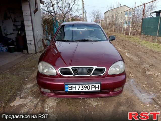 Красный Дэу Ланос, объемом двигателя 1.5 л и пробегом 320 тыс. км за 2300 $, фото 1 на Automoto.ua