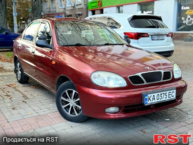 Красный Дэу Ланос, объемом двигателя 1.5 л и пробегом 290 тыс. км за 1950 $, фото 1 на Automoto.ua