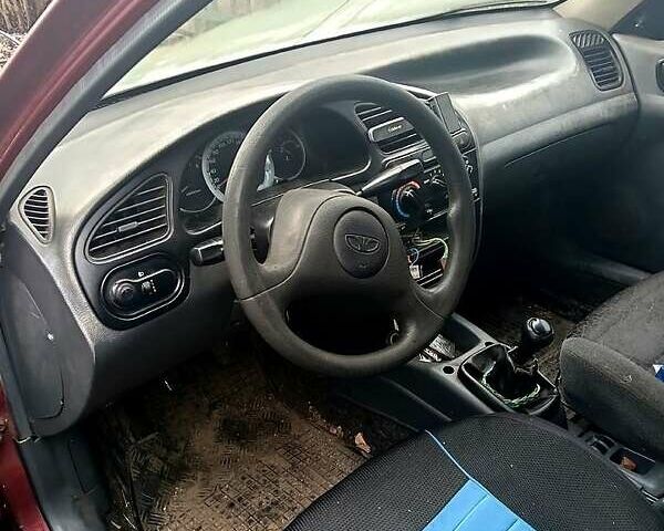 Красный Дэу Ланос, объемом двигателя 1.5 л и пробегом 100 тыс. км за 1180 $, фото 1 на Automoto.ua