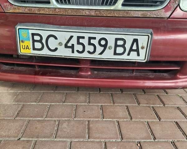 Красный Дэу Ланос, объемом двигателя 1.6 л и пробегом 187 тыс. км за 1800 $, фото 1 на Automoto.ua