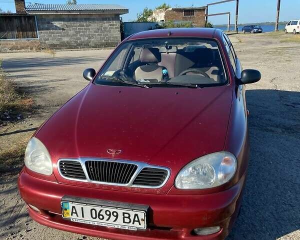 Красный Дэу Ланос, объемом двигателя 1.5 л и пробегом 209 тыс. км за 2500 $, фото 1 на Automoto.ua