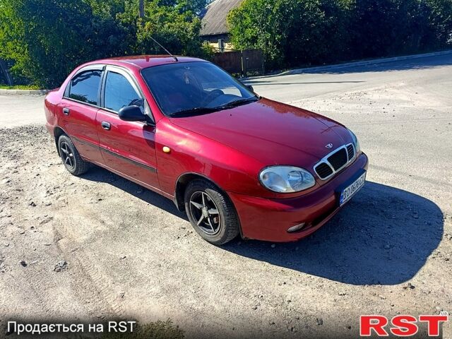 Червоний Деу Ланос, об'ємом двигуна 1.5 л та пробігом 313 тис. км за 2480 $, фото 1 на Automoto.ua