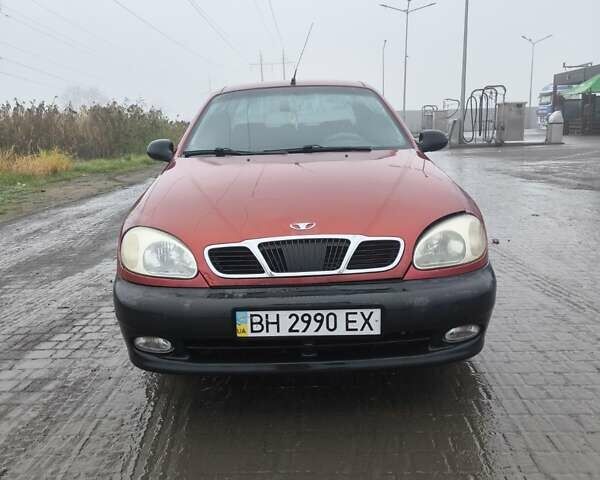 Красный Дэу Ланос, объемом двигателя 1.5 л и пробегом 305 тыс. км за 1800 $, фото 1 на Automoto.ua