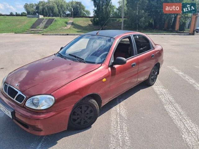 Красный Дэу Ланос, объемом двигателя 1.5 л и пробегом 270 тыс. км за 2100 $, фото 1 на Automoto.ua