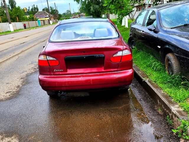 Червоний Деу Ланос, об'ємом двигуна 1.6 л та пробігом 190 тис. км за 600 $, фото 1 на Automoto.ua