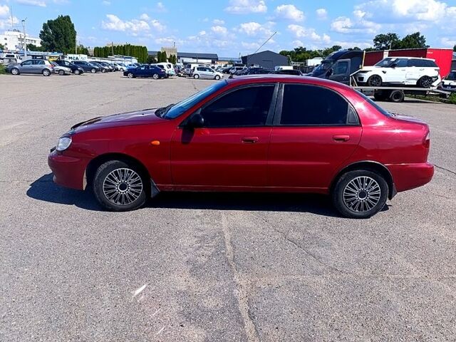 Красный Дэу Ланос, объемом двигателя 1.5 л и пробегом 278 тыс. км за 2700 $, фото 1 на Automoto.ua