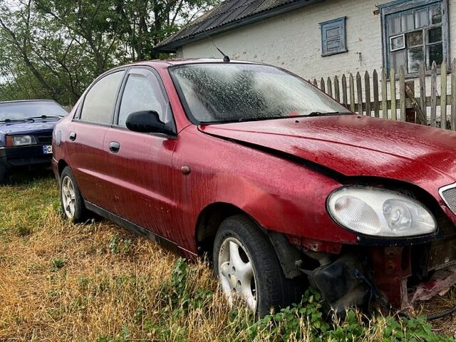 Красный Дэу Ланос, объемом двигателя 1.5 л и пробегом 200 тыс. км за 900 $, фото 1 на Automoto.ua