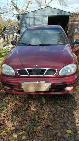 Красный Дэу Ланос, объемом двигателя 1.5 л и пробегом 228 тыс. км за 2500 $, фото 1 на Automoto.ua