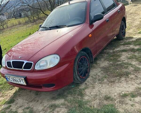 Червоний Деу Ланос, об'ємом двигуна 1.39 л та пробігом 107 тис. км за 2850 $, фото 1 на Automoto.ua