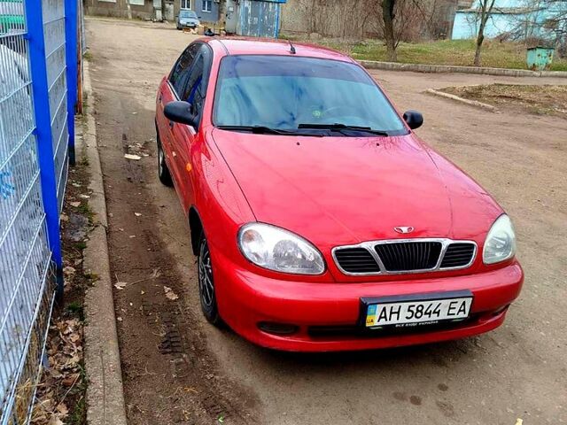 Красный Дэу Ланос, объемом двигателя 1.5 л и пробегом 140 тыс. км за 2300 $, фото 1 на Automoto.ua